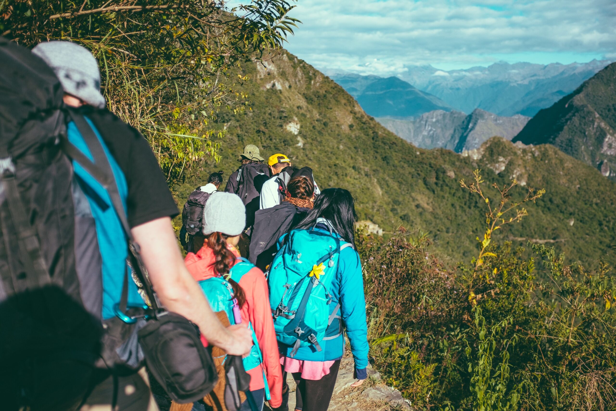 group hiking through the mountains